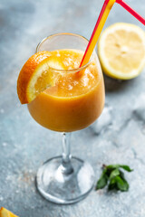 Still Life Glass of Fresh Orange Juice on Vintage Wood Table with Copy Space Background