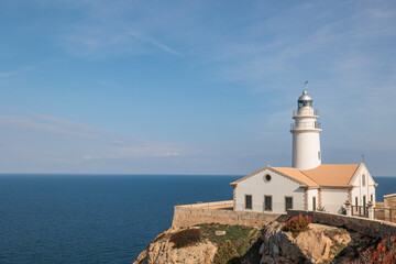 Fototapeta na wymiar Lighthouse on the coast Mallorca