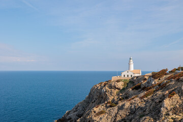 Fototapeta na wymiar Lighthouse on the coast Mallorca