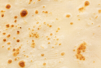 Pan fried pancake as a background.