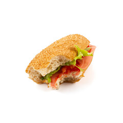 Sub sandwich with cold cuts cheese lettuce and tomato has been bitten once white top. has been bitten once white top