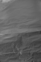 Silver background of crumpled aluminum foil