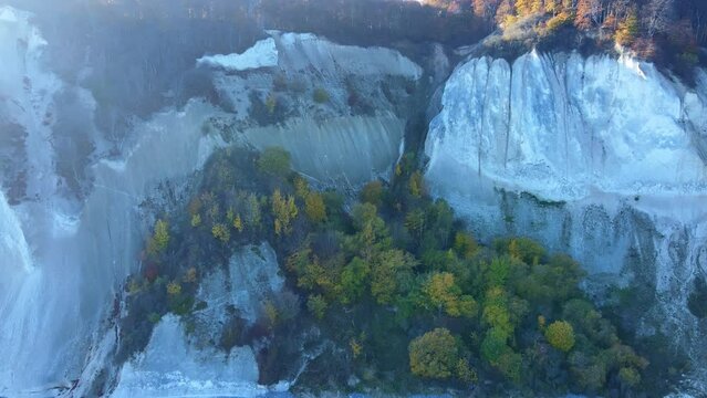 The White Cliffs of Denmark, also known as M&oslash;ns Klint. A Chalk stone cliff overlooking the Baltic sea. Aerial footage.