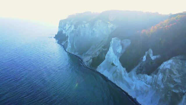 The White Cliffs of Denmark, also known as M&oslash;ns Klint. A Chalk stone cliff overlooking the Baltic sea. Aerial footage.