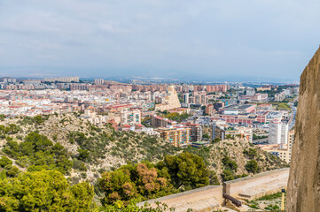 A view towards the suburbs from the castle of Saint Ferran above Alicante on a spring day