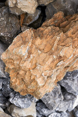 Close-up of various rocks for sale in an aquarium shop