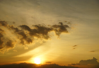 Obraz na płótnie Canvas Golden sunset in the clouds