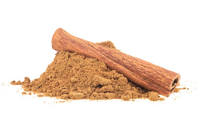 Cinnamon powder and cinnamon stick isolated on a white background. Aromatic cinnamon.