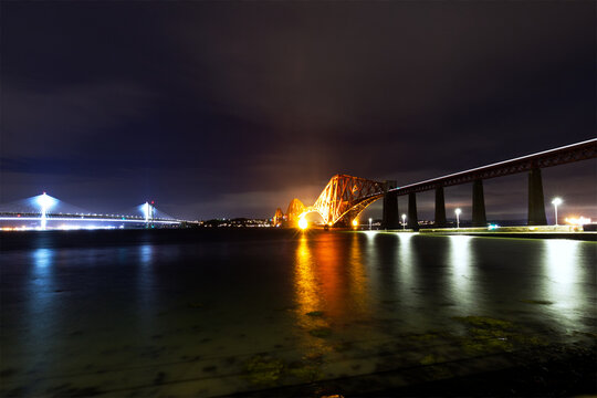 Train light through Forth Rail Bridge - A long-exposure photo was taken when the train passed through the bridge.