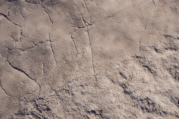 old gray bitumen texture, cracks and bumps
