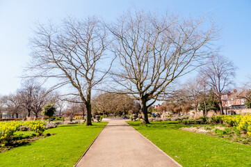 London, United Kingdom, 22 March 2022: Central Park Edwardian Garden features fountain pond and stone-flagged terraces and paths and semi-circular steps
