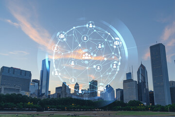 Chicago skyline from Butler Field to financial district skyscrapers at sunset, Illinois, USA. Parks and gardens. Social media hologram. Concept of networking and establishing new people connections