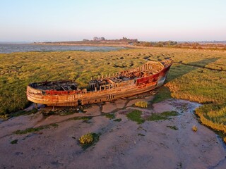 Aerial drone. Shipwreck of the Aberdeen fishing boat at Motney Hill, Rainham Creek, Medway, Kent,...