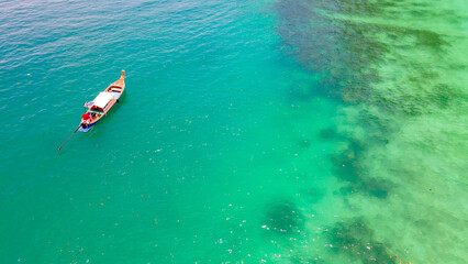 Fototapeta premium High angle, beautiful sea, and tourists boats at Phi Phi Island, Phuket, Thailand