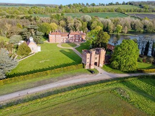 Aerial drone view of Lullingstone Castle and The World Garden in Eynsford, Kent, England.