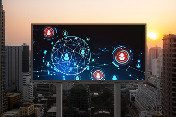 Glowing Social media icons on billboard over sunset panoramic city view of Bangkok. The concept of...