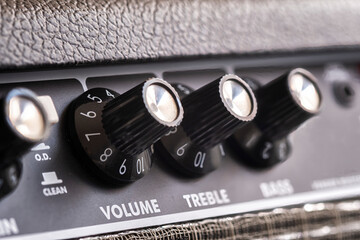 selective focus of the volume, treble and bass control knobs of a guitar amplifier, equalization...