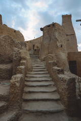 Fototapeta premium Amazing View to the Sandstone Walls and Ancient Fortress of an Old Shali Mountain village in Siwa Oasis, Egypt