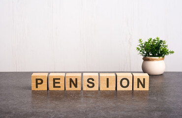 word pension made with wood building blocks