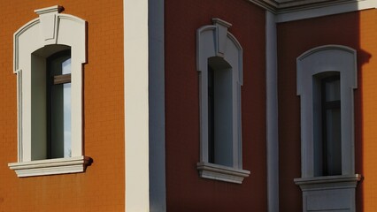 arched windows in brick facade as background