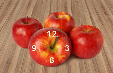 Apples on a wooden surface