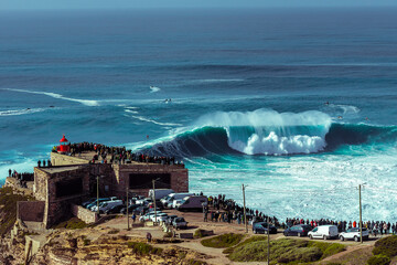 Big waves in Nazare, Portugal. Waves of the Atlantic Ocean in Portugal. Waves for surfing.