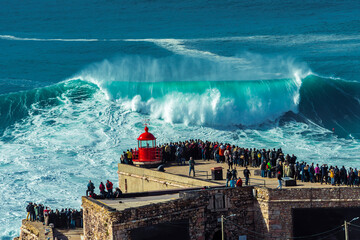 Big waves in Nazare, Portugal. Waves of the Atlantic Ocean in Portugal. Waves for surfing.