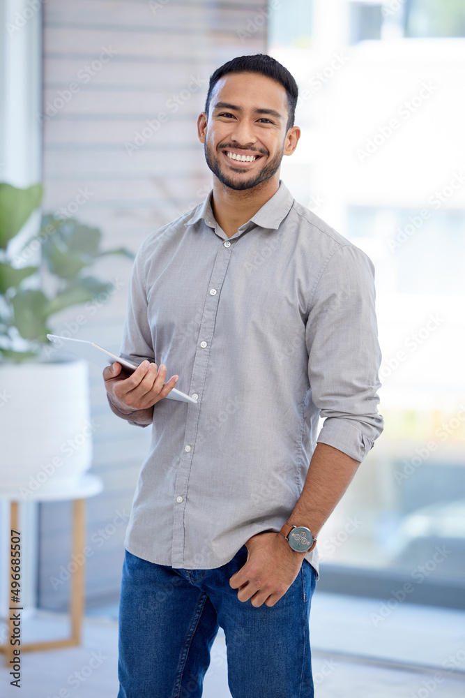 Poster ive always been driven to achieve my goals. portrait of a young businessman using a digital tablet i