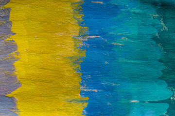 Abstract background closeup of a painting with brushstrokes. Rough art paint smear. Large multicolor spots of brush strokes and palette knife on the canvas