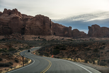 The beautiful road in The Arches Park. Classic american road on the west - flat and curved road