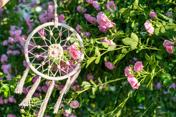 Dreamcatcher handmade spider net or web charm on willow hoop, string, beads. Native crafts items in...