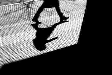 Blurry silhouette shadow of a person in the city in winter - 496689125