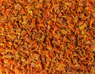  dried carrot pieces background. Spices and food ingredients.