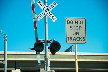Railroad crossing freeway street signs