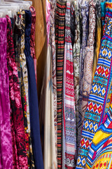 Natural, colorful clothes, oriental designs in shop in town on the Red Sea on the Sinai Peninsula, Dahab, Egypt
