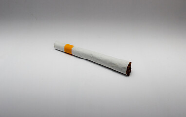 a cigarette isolated on a white background.