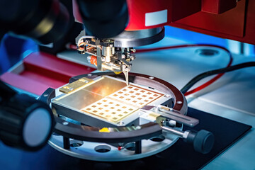 Manufacturing micro transistors. Production microcircuit boards close-up. Microchip manufacturing....