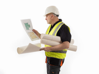 Builder with architectural drawings in hands. Portrait of builder on white background. An architect in construction uniform. Man in construction helmet and a vest. He works for construction company