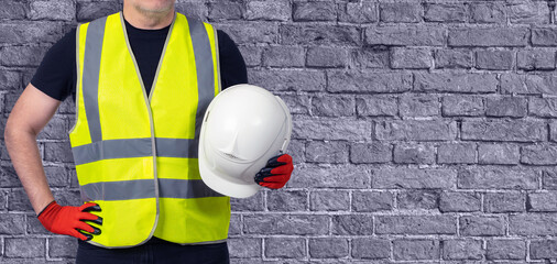 Builder man. Man in yellow vest. Portrait of builder without face. Guy with white safety helmet....