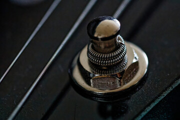 Close up photograph of the parts on an electric guitar