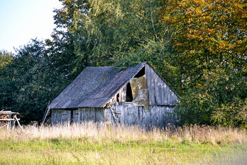 Old wooden barn building in the countryside.