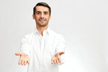businessmen white shirt posing stretches out his hands emotions isolated background