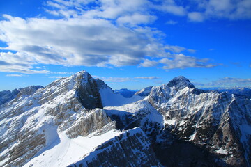 Fototapeta na wymiar Snowy mountains of Slovenian Alps