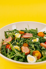salad ingredients on yellow background.healthy food