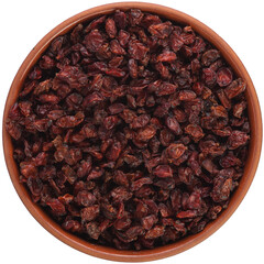 Red barberry in a brown ceramic bowl isolated on white background. Isolated close-up photo of food close up from above on white background.