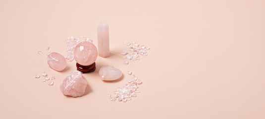 Healing reiki chakra crystals therapy. Alternative rituals with pink quartz for wellbeing,...