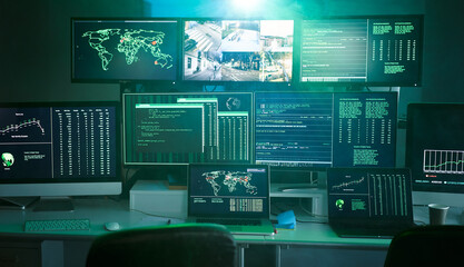 Control room monitoring surveillance video camera control city - Empty space dark room office full...