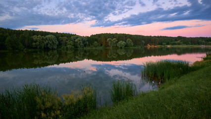 Fototapeta premium sunset over the Strizhen river in Chernihiv, Ukraine