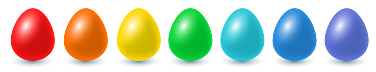 Seven Easter eggs in a row in rainbow colors