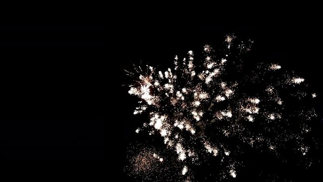 4K. long time seamless loop of real colorful fireworks festival in the sky display at night during national holiday, new year party or celebration event
